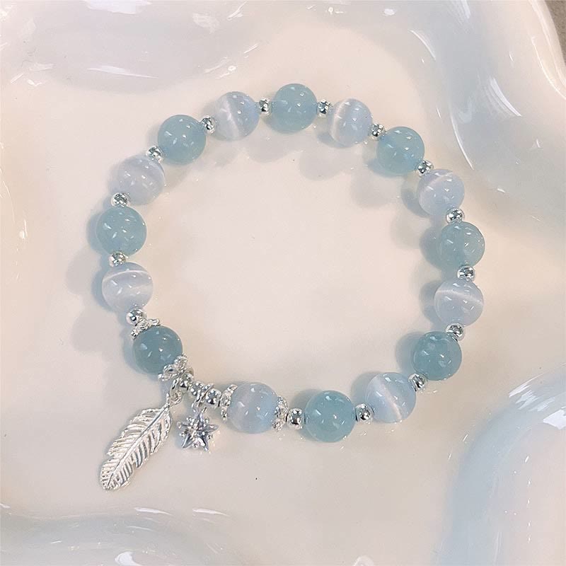 KarmaRipple's 925 Sterling Silver Aquamarine Cat's Eye Balancing Feather Star Talisman Bracelet p4