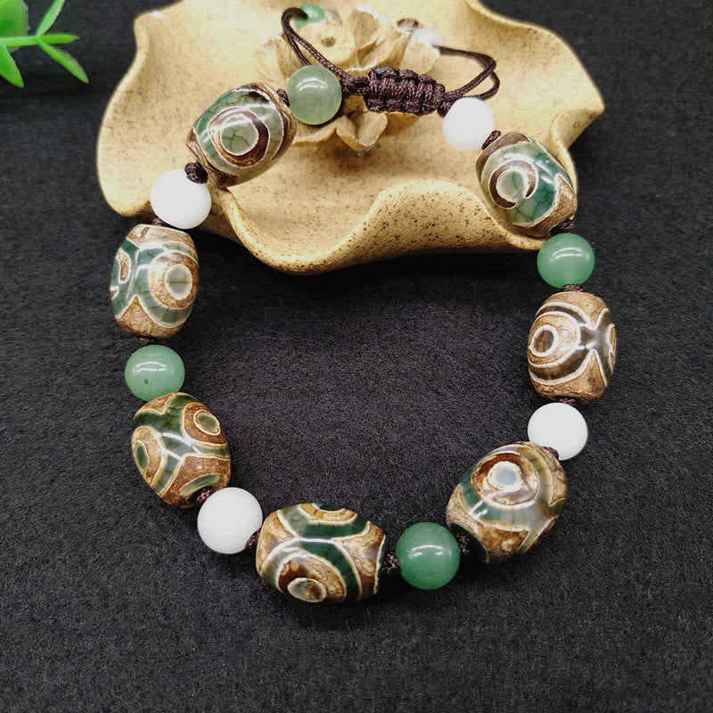 KarmaRipple's Tibetan Three-eyed Dzi Bead Fortune Protection Woven Bracelet p4