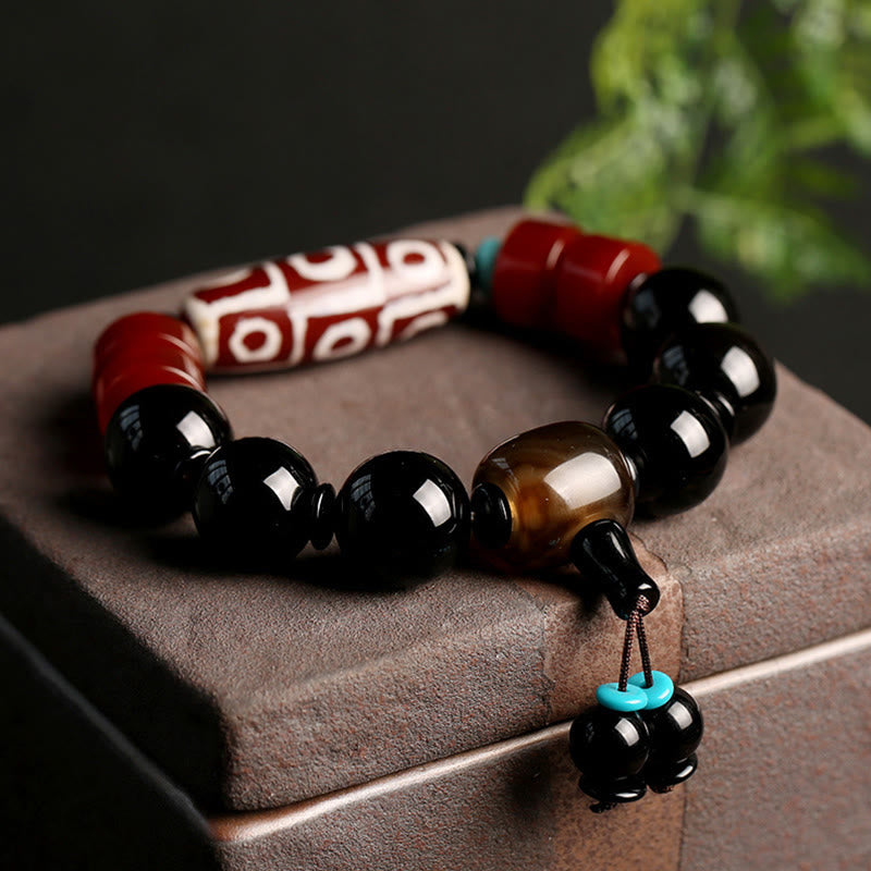 KarmaRipple's Tibetan Nine-Eye Dzi Bead Black Onyx Wealth Protection Bracelet p1