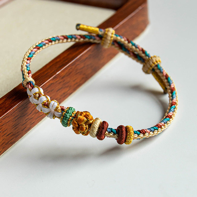 KarmaRipple's Handmade Dunhuang Color Peach Blossom Pattern Braid String Bracelet p1