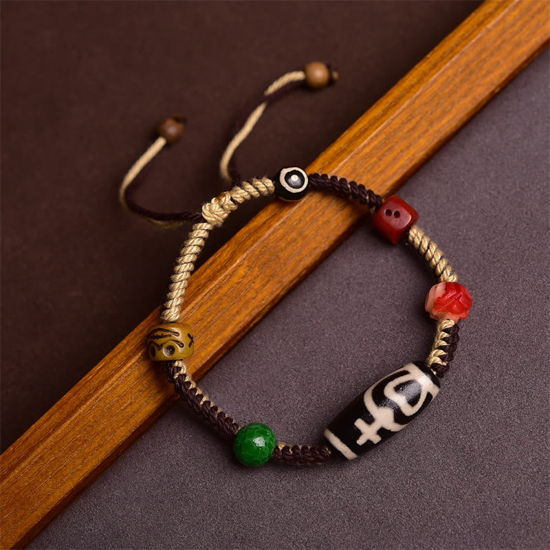 KarmaRipple's Handmade Tibetan Dzi Bead Wealth Woven Rope Bracelet p1