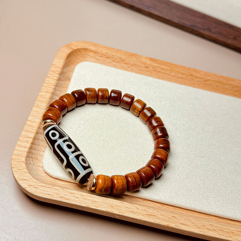 KarmaRipple's Tibetan Yak Bone Nine-Eye Dzi Bead Protection Bracelet p2