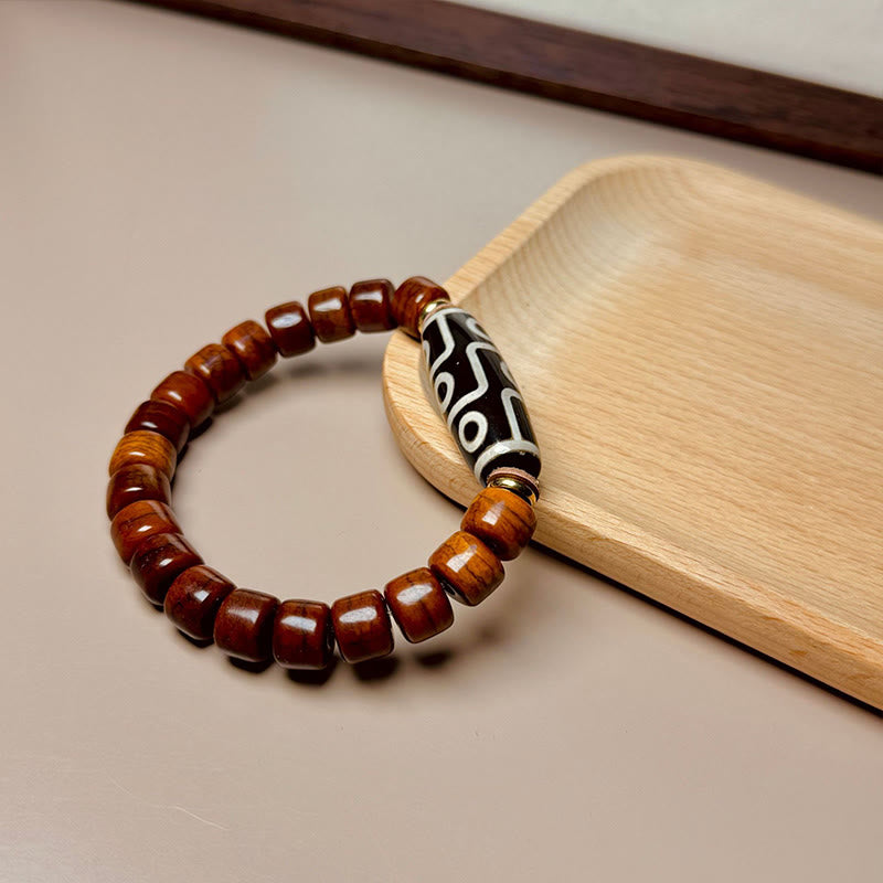KarmaRipple's Tibetan Yak Bone Nine-Eye Dzi Bead Protection Bracelet p3