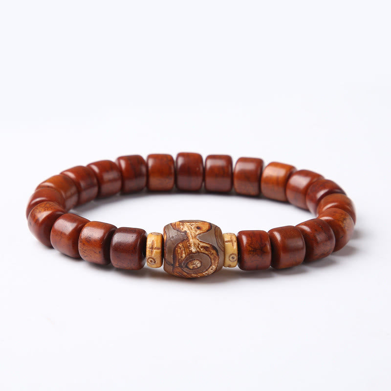 KarmaRipple's Tibetan Yak Bone Three-Eyed Dzi Bead Sheep Horn Red Agate Strength Bracelet p1