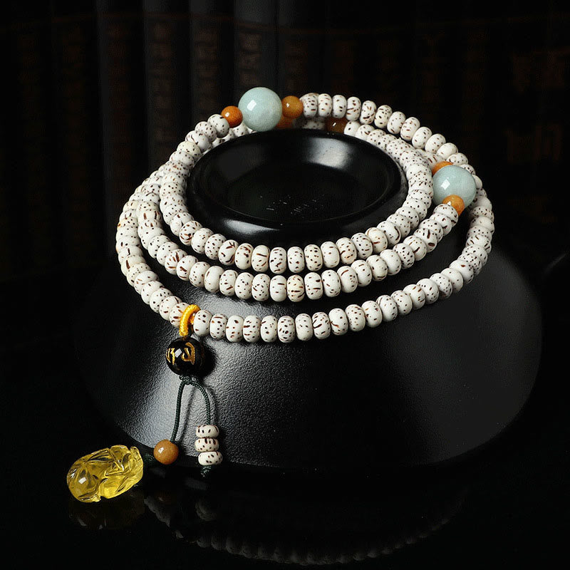 KarmaRipple's Tibetan Bodhi Seed Amber Agate Wealth Bracelet p1