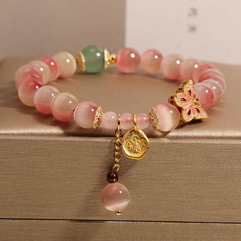 KarmaRipple's Gradient Pink Cat's Eye Butterfly Peace Bracelet p1