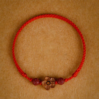 Bracelet de cheville en bois de pêcher et cinabre à petites fleurs de pêcher de KarmaRipple