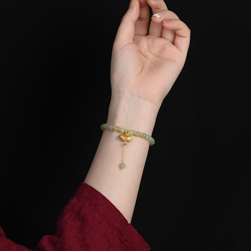KarmaRipple's Authentic Hetian Jade Lotus Fortune Bracelet p3