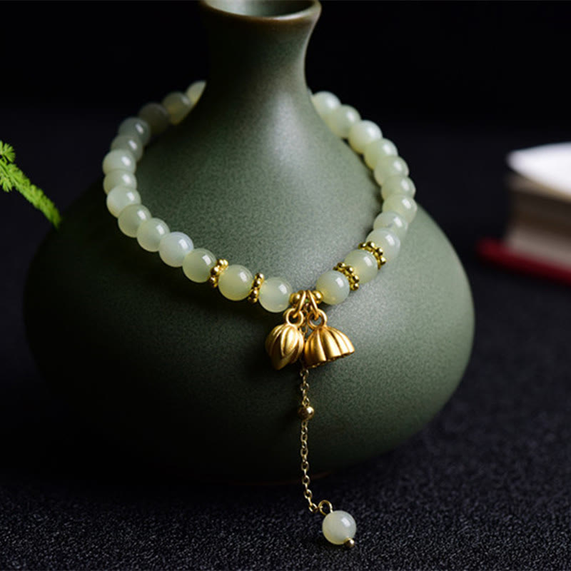 KarmaRipple's Authentic Hetian Jade Lotus Fortune Bracelet p2
