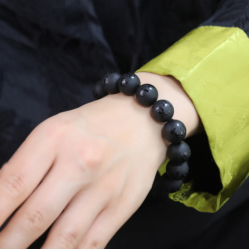 KarmaRipple's Authentic Black Onyx Om Mani Padme Hum Carved Protection Bracelet p5