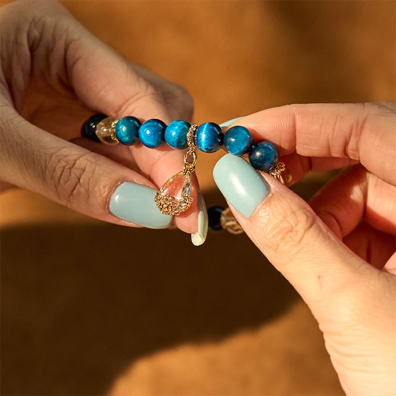 KarmaRipple's Blue Tiger Eye Ivory Gemstone Water Drop Strength Bracelet p6