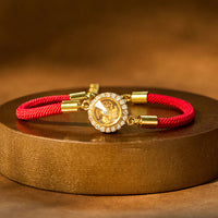 KarmaRipple's Red String Bronze Brass Rotatable Windmill Feng Sheng Shui Qi Protection Woven Bracelet