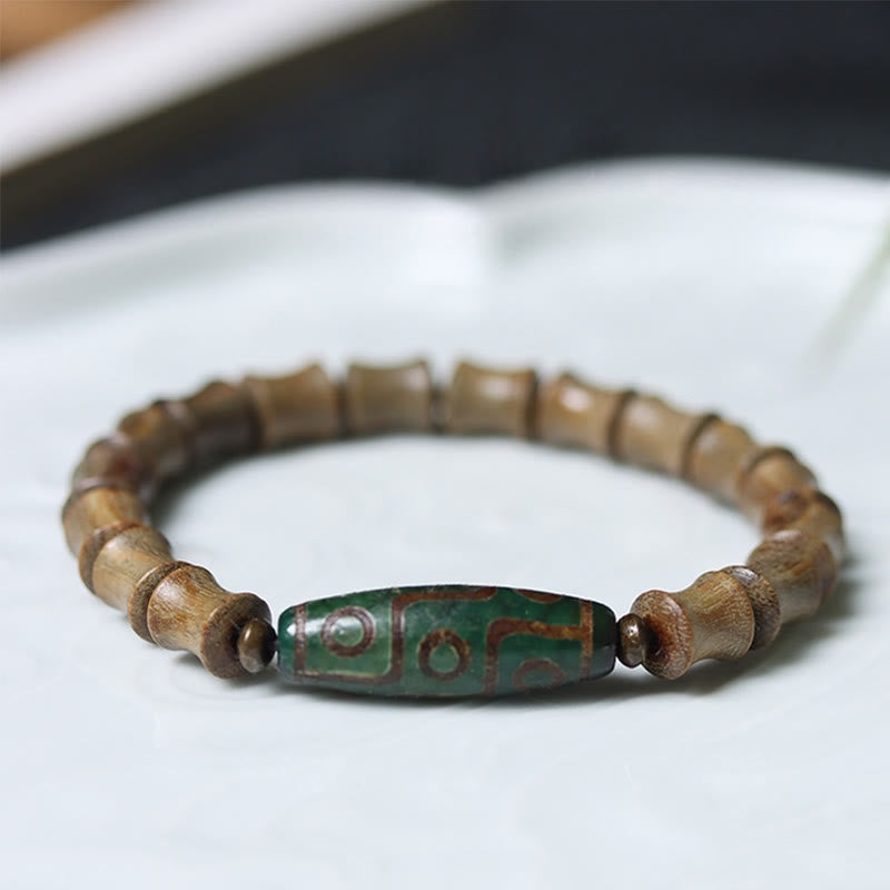 KarmaRipple's Tibetan Nine-Eye Dzi Bead Green Sandalwood Peace Bracelet p1