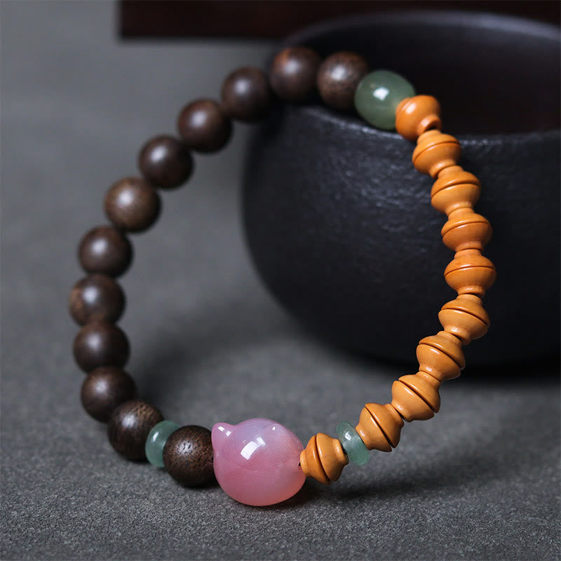 KarmaRipple's 6mm Qinan Agarwood Olive Pit Yanyuan Agate Cat Shape Balance Bracelet p2