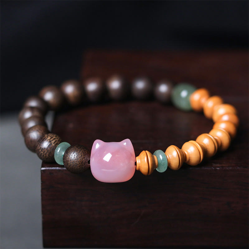 KarmaRipple's 6mm Qinan Agarwood Olive Pit Yanyuan Agate Cat Shape Balance Bracelet p1
