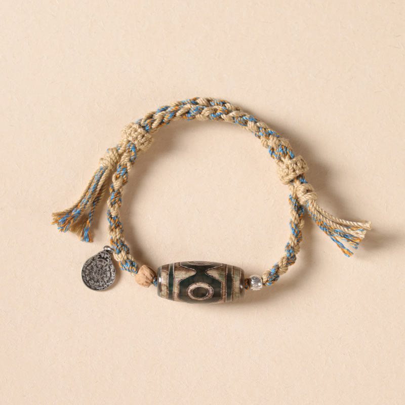 KarmaRipple's Tibetan Dzi Bead Wealth Protection Woven Bracelet p1