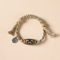 KarmaRipple's Tibetan Dzi Bead Wealth Protection Woven Bracelet