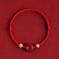 Bracelet de cheville en bois de pêcher avec boucle de paix et cinabre de KarmaRipple