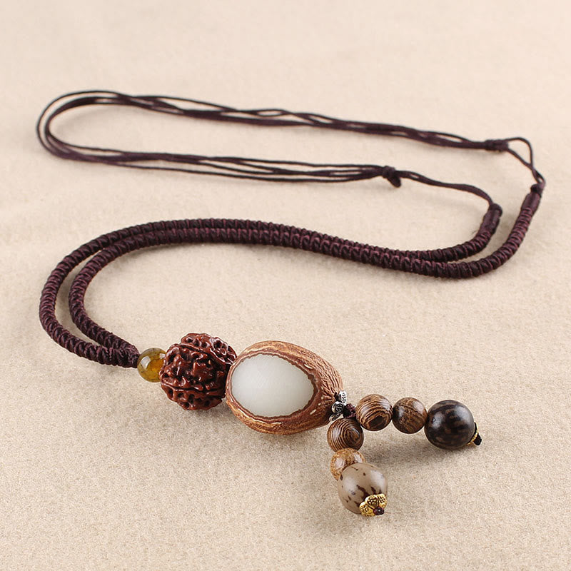 KarmaRipple's Bodhi Seed Lotus Wisdom Balance Pendant Necklace p1