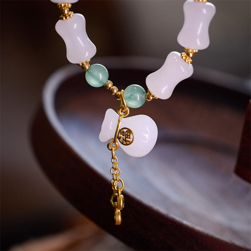 KarmaRipple's Authentic Ivory Golden Silk Jade Bamboo Pattern Wealth Fortunate Bag Fu Character Bracelet p3