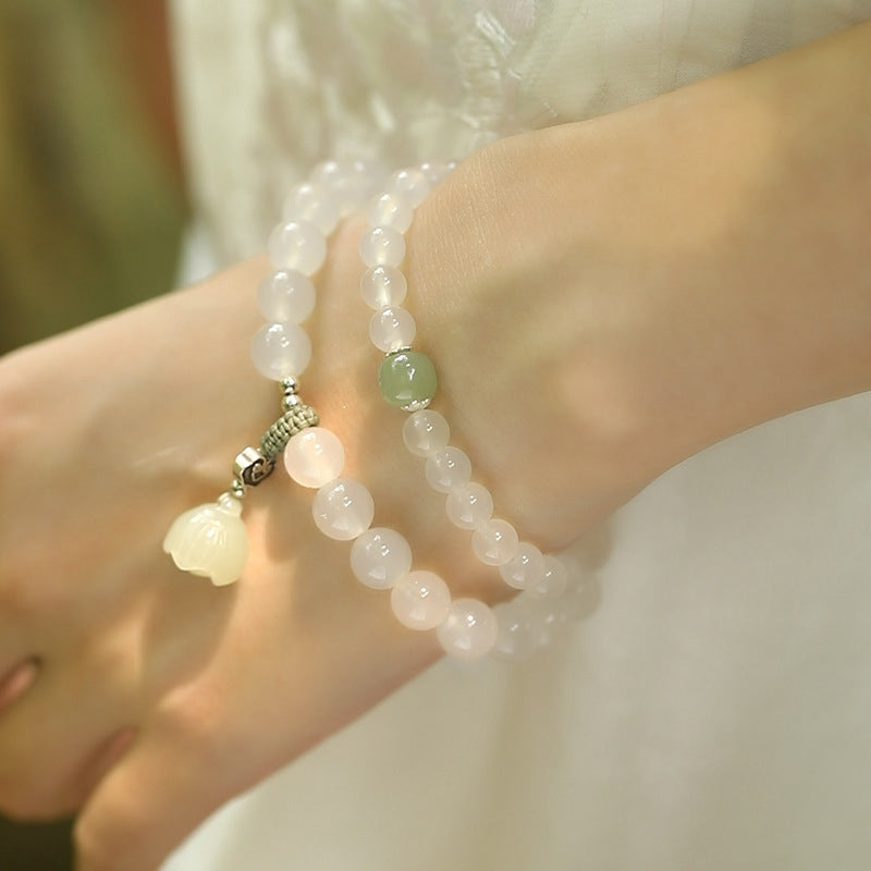 KarmaRipple's Ivory Agate Jade Lotus Protection Bracelet p3
