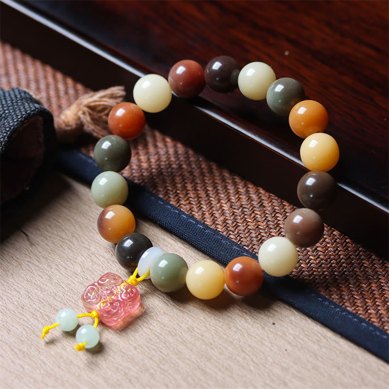 KarmaRipple's Authentic Multicolored Gradient Bodhi Seed Liuli Glass Talisman Peace Bracelet p1