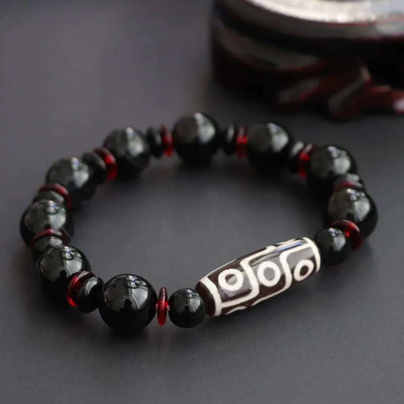 KarmaRipple's Black Onyx Nine-Eye Dzi Bead Wealth Protection Bracelet p1