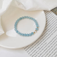 KarmaRipple's 14K Gold Plated Bronze Aquamarine Ivory Gemstone Ivory Agate Blue Gemstone Balancing Bracelet