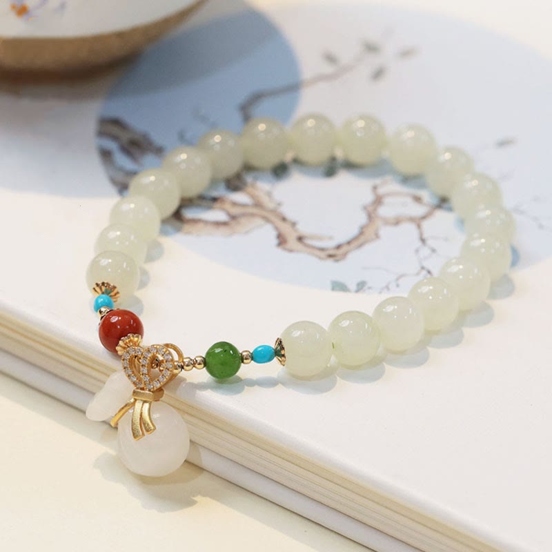 KarmaRipple's Authentic Hetian Ivory Jade 14K Gold Plated Money Bag Blessing Bracelet p1