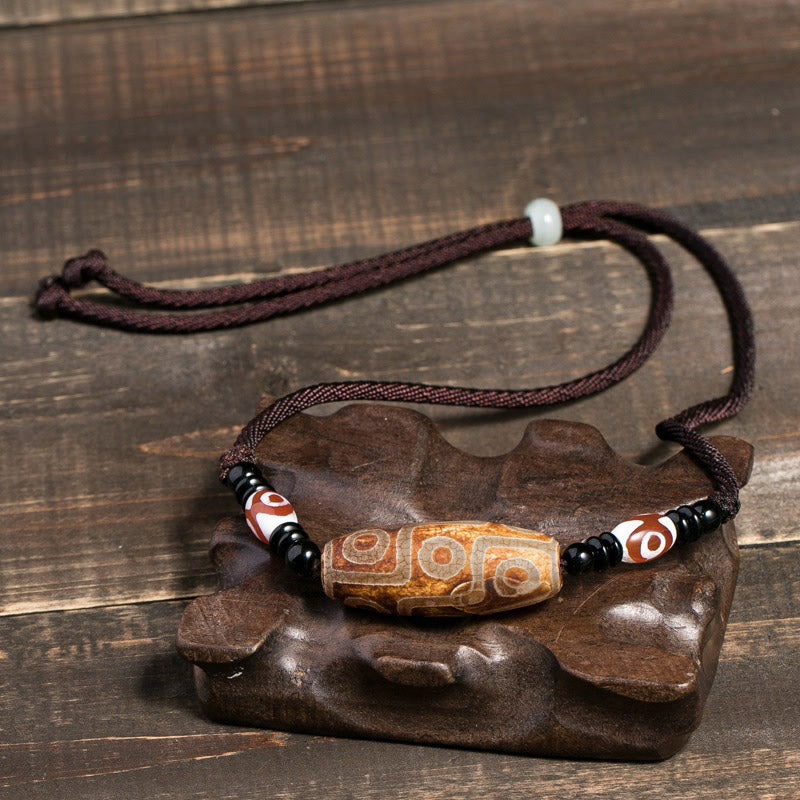 KarmaRipple's Tibetan Nine-Eye Dzi Bead Protection String Pendant p8