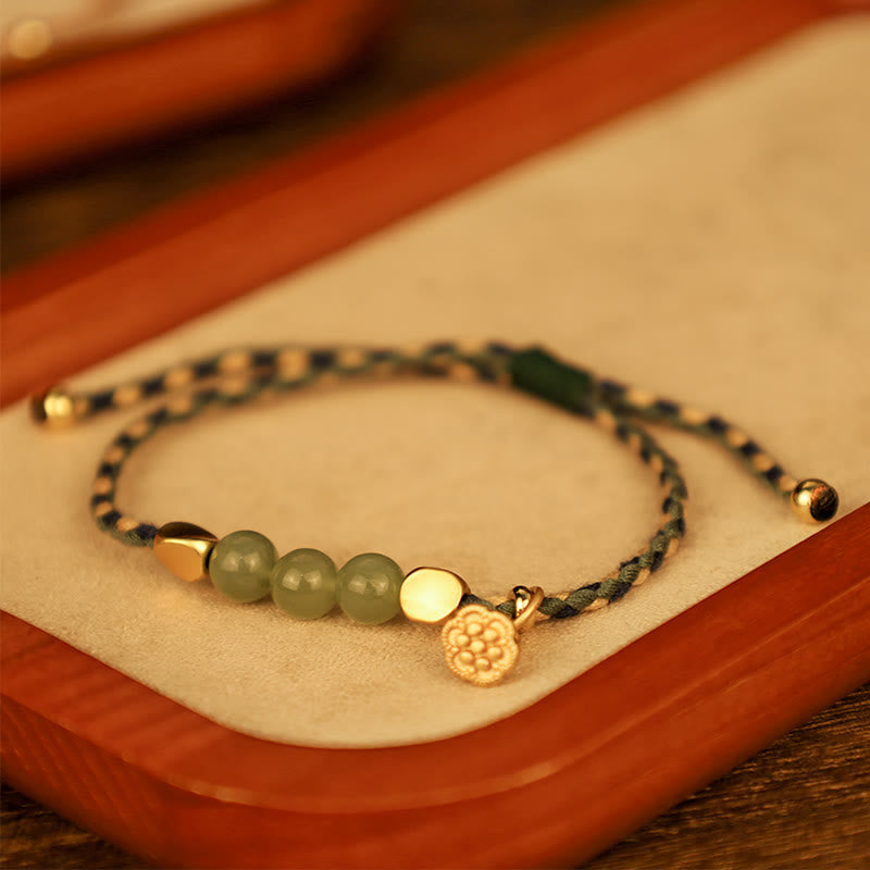 KarmaRipple's Handcrafted Hetian Jade Lotus Talisman Fortune Woven Bracelet p1