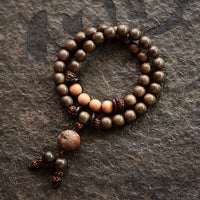 Bracelet Mala Talisman de Protection en Bois de Santal Tibétain de KarmaRipple