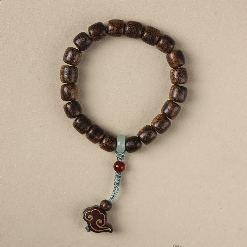 KarmaRipple's Agarwood Bronze Coin Auspicious Cloud Calm Bracelet p2