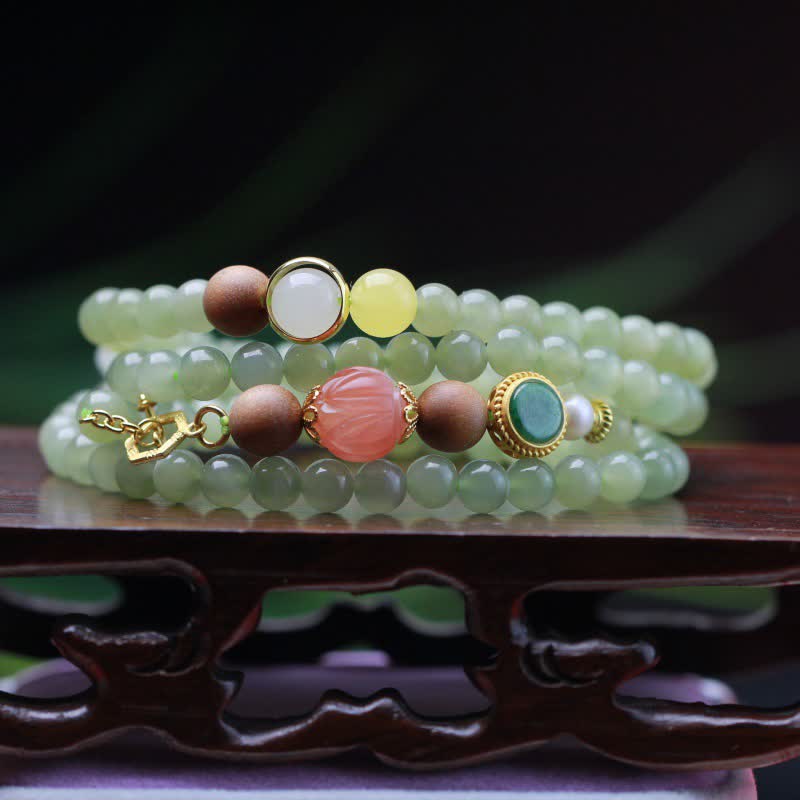 KarmaRipple's Authentic Hetian Jade Amber Lotus Red Agate Fortune Abundance Bracelet p1
