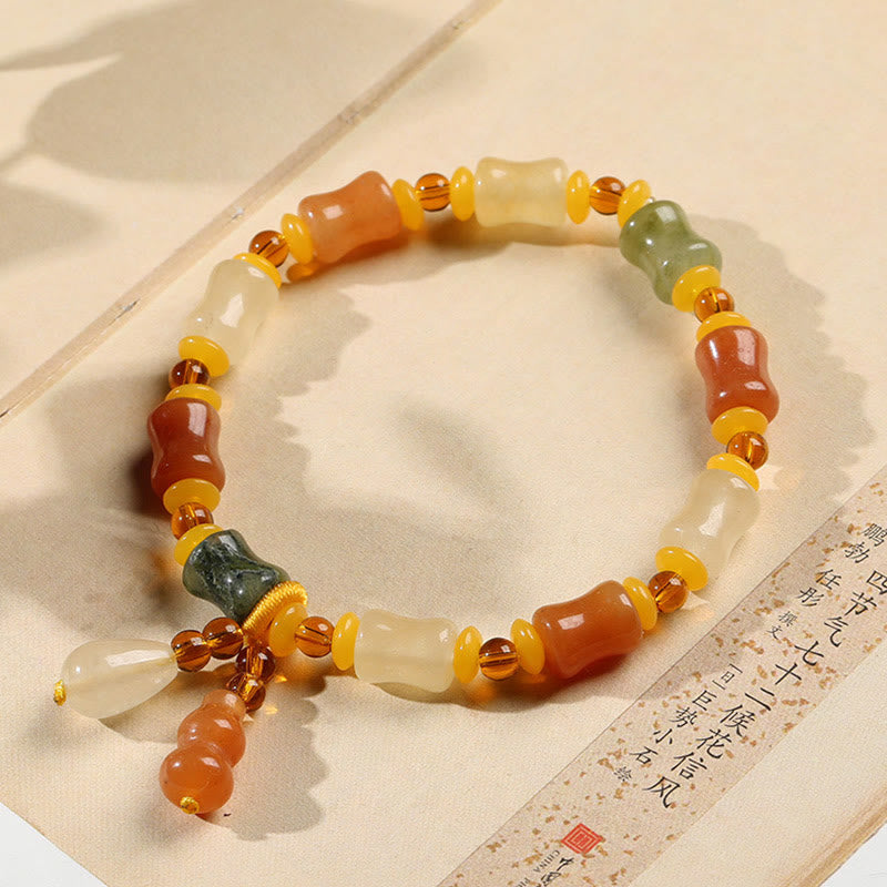 KarmaRipple's Authentic Golden Silk Jade Gourd Wealth Talisman Bracelet p2