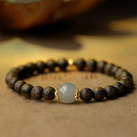 KarmaRipple's Agarwood Jade Strength Calm Bracelet