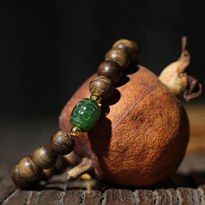 KarmaRipple's 999 Gold Brunei Agarwood Cyan Jade Lotus Flower Peace Strength Bracelet p2