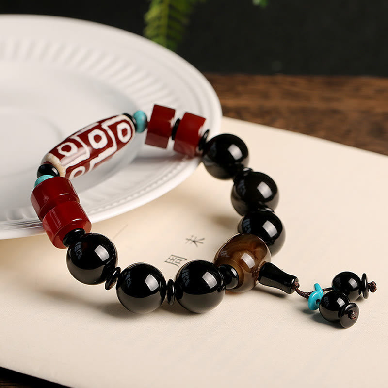 KarmaRipple's Tibetan Nine-Eye Dzi Bead Black Onyx Wealth Protection Bracelet p2