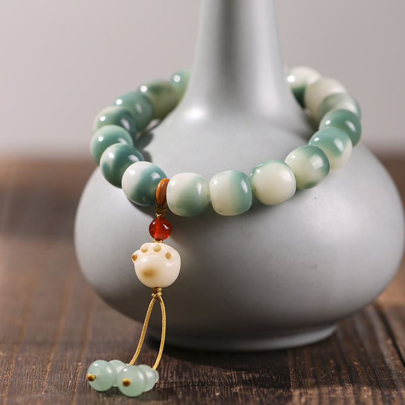 KarmaRipple's Gradient Bodhi Seed Nine Tailed Fox Cat Paw Claw Pine Cone Peace Bracelet p3