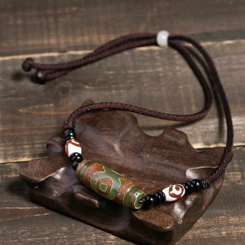 KarmaRipple's Tibetan Nine-Eye Dzi Bead Protection String Pendant p6