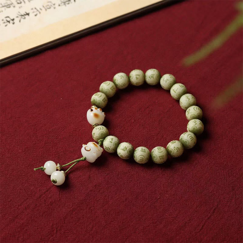 KarmaRipple's Green Bodhi Seed Cat Paw Om Mani Padme Hum Engraved Wisdom Bracelet p1