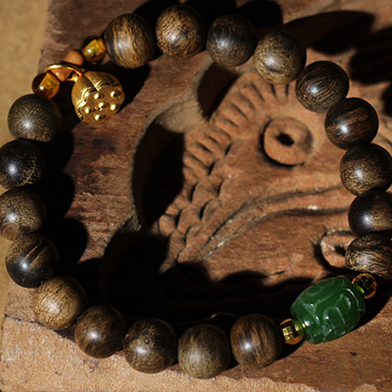KarmaRipple's 999 Gold Brunei Agarwood Cyan Jade Lotus Flower Peace Strength Bracelet p16