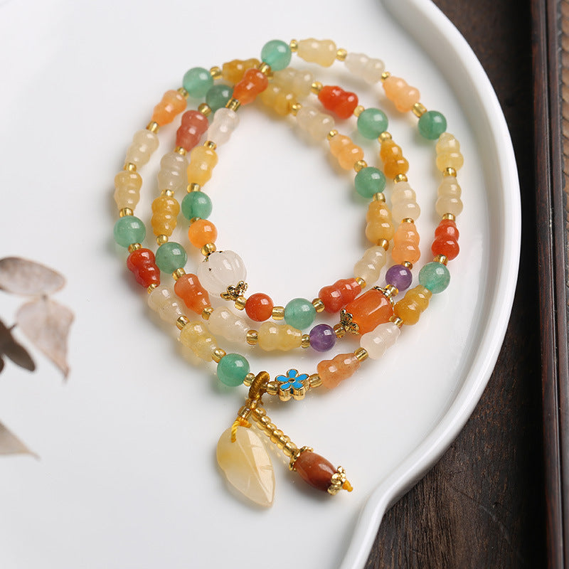 KarmaRipple's Golden Silk Jade Gourd Wealth Bracelet p1
