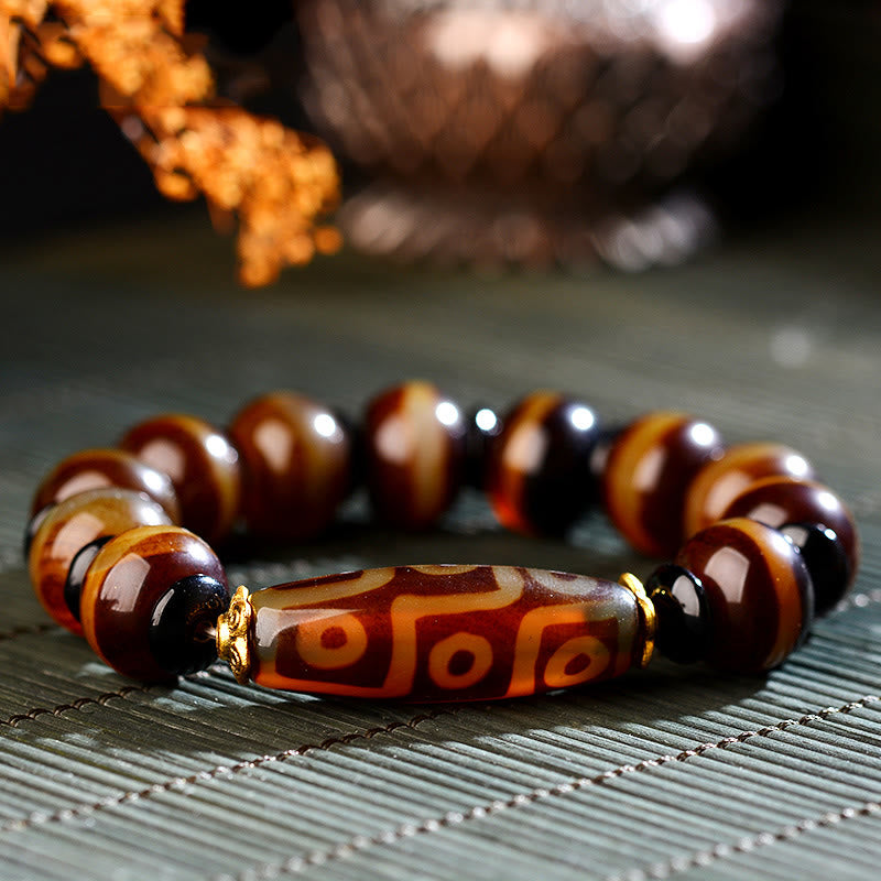 KarmaRipple's Tibetan Authentic Nine-Eye Dzi Bead Agate Wealth Blessings Bracelet p1