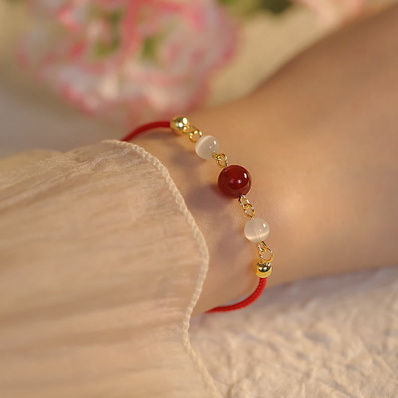 KarmaRipple's Red Agate Cat Eye Woven String Confidence Bracelet p1
