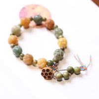 Bracelet d'équilibre de sagesse en bois de santal vert et graines de lotus Bodhi de KarmaRipple