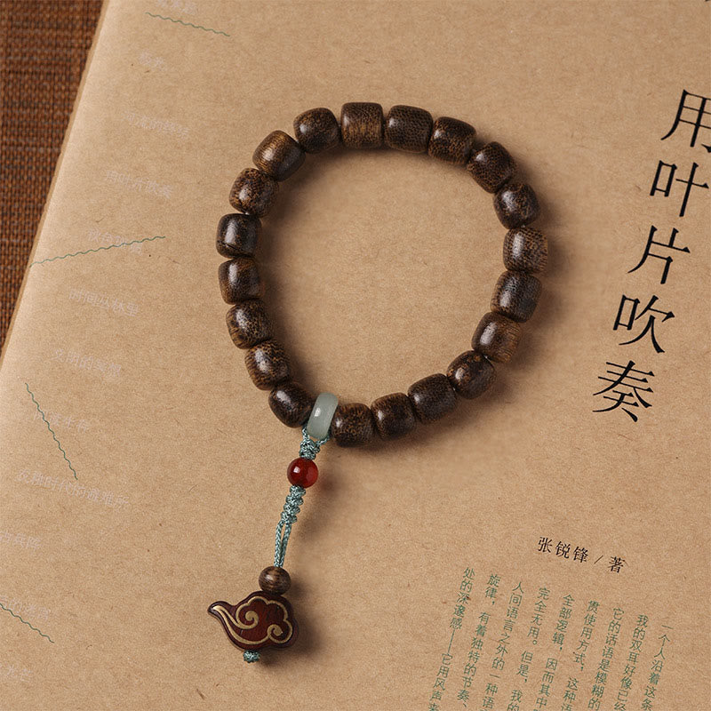 KarmaRipple's Agarwood Bronze Coin Auspicious Cloud Calm Bracelet p10