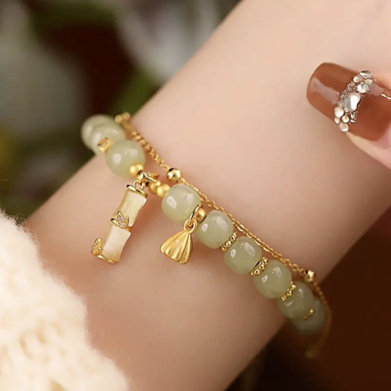 KarmaRipple's Authentic Hetian Jade Prosperity Lotus Bamboo Talisman Bracelet p1