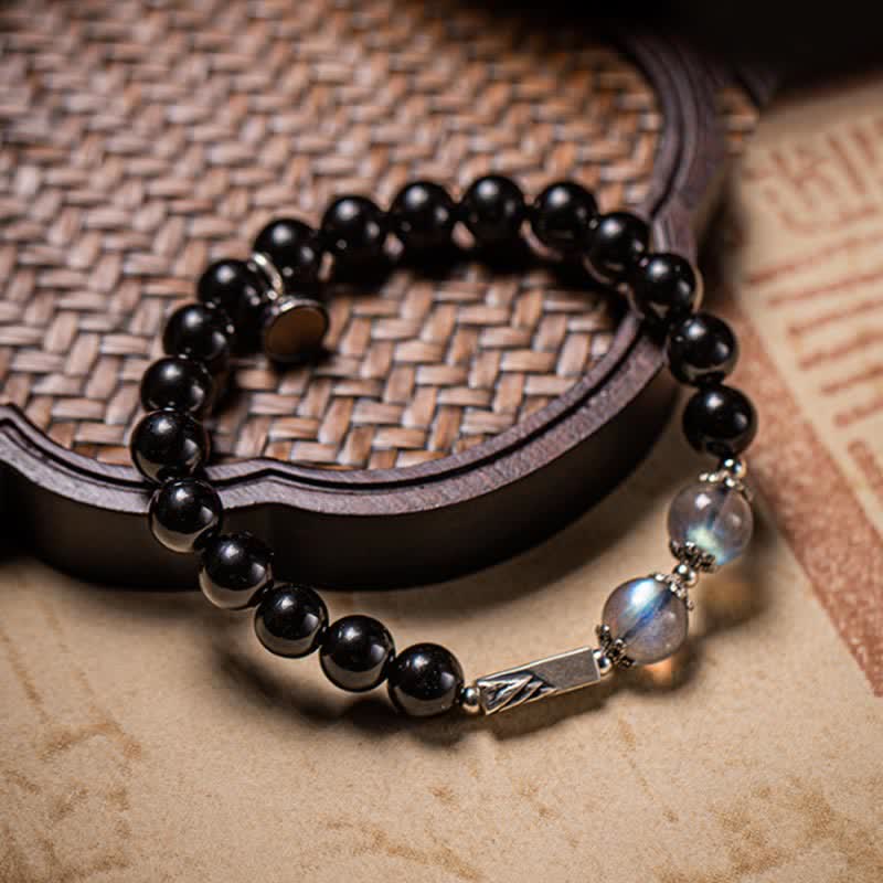 KarmaRipple's 925 Sterling Silver Obsidian Moonstone Strength Pair Bracelet p1