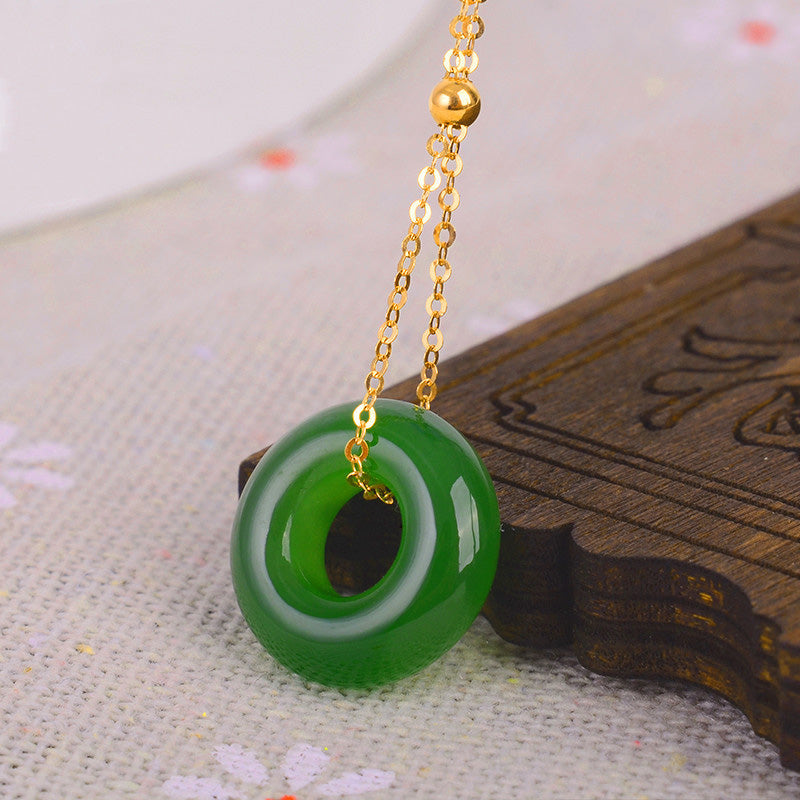 KarmaRipple's Round Cyan Jade Balancing 14K Gold Pendant Necklace p5